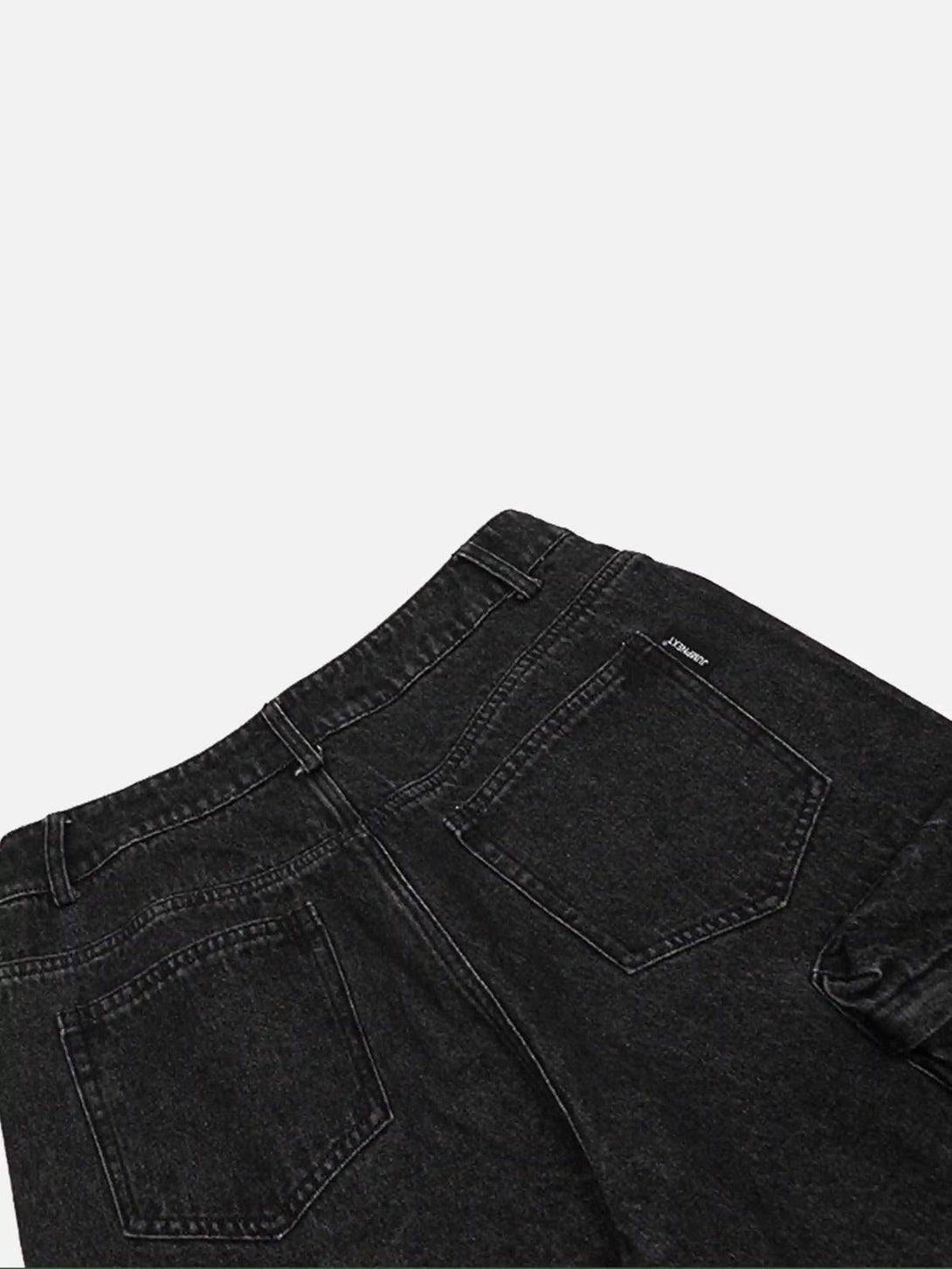 Detailed fabric and stitching of black washed distressed jeans by TALISHKO, showcasing style.