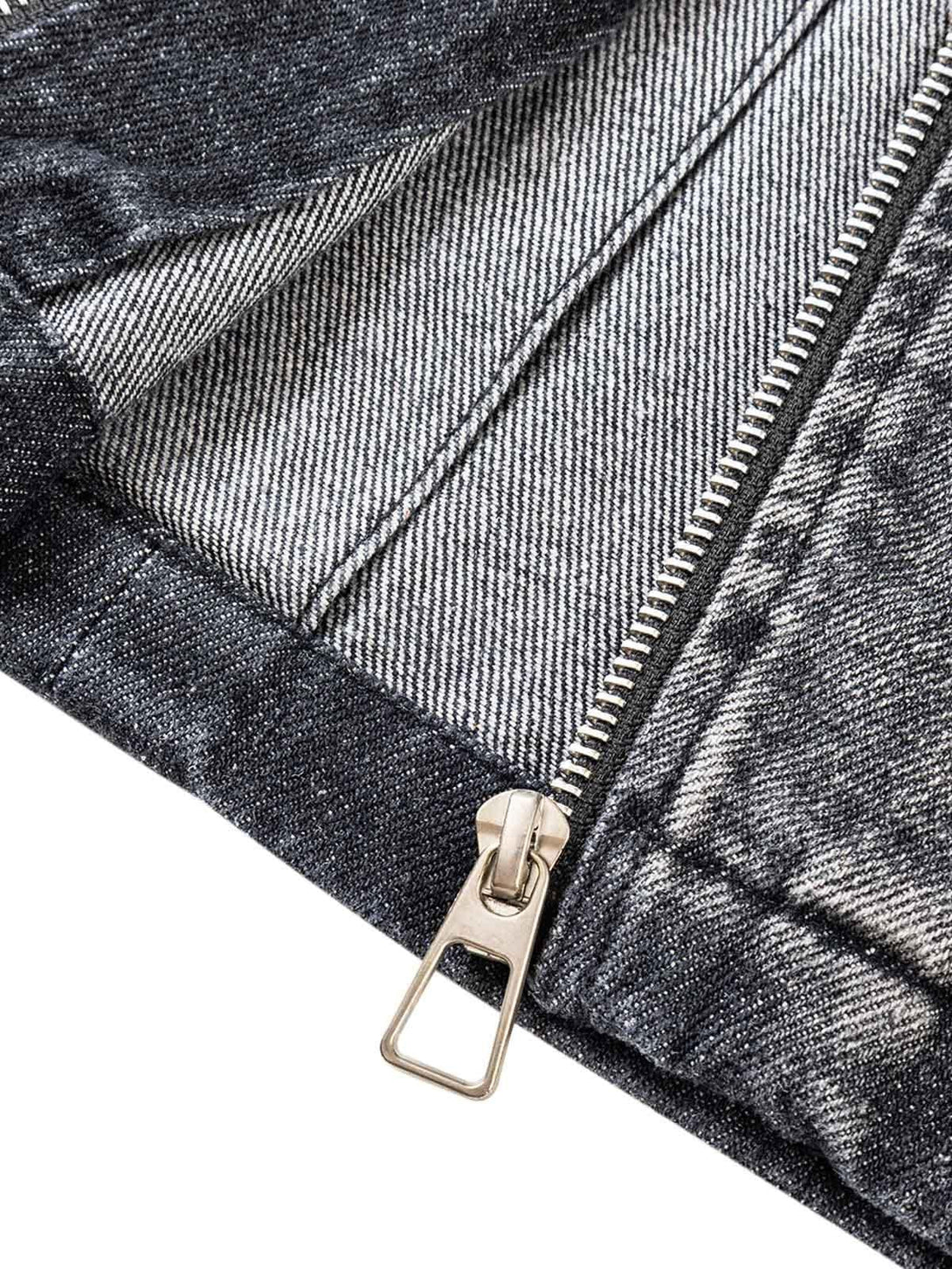 TALISHKO denim jacket close-up, focusing on zipper detail and textured fabric.