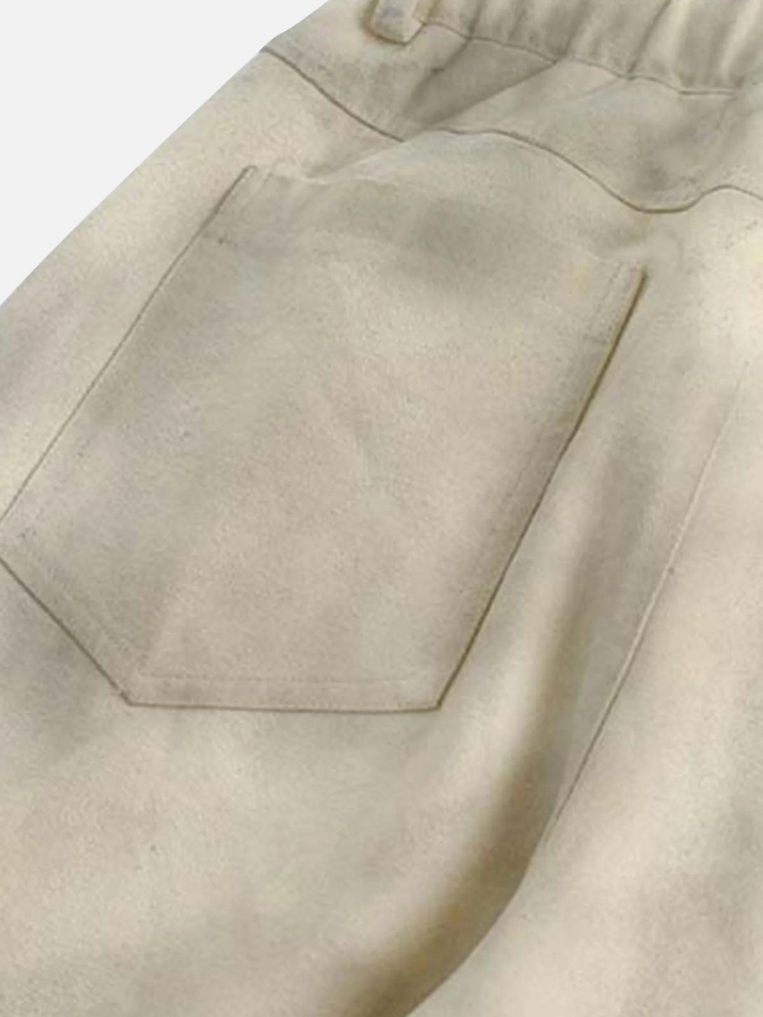 Close-up of TALISHKO sweatpants pocket, highlighting the casual, relaxed texture and design.