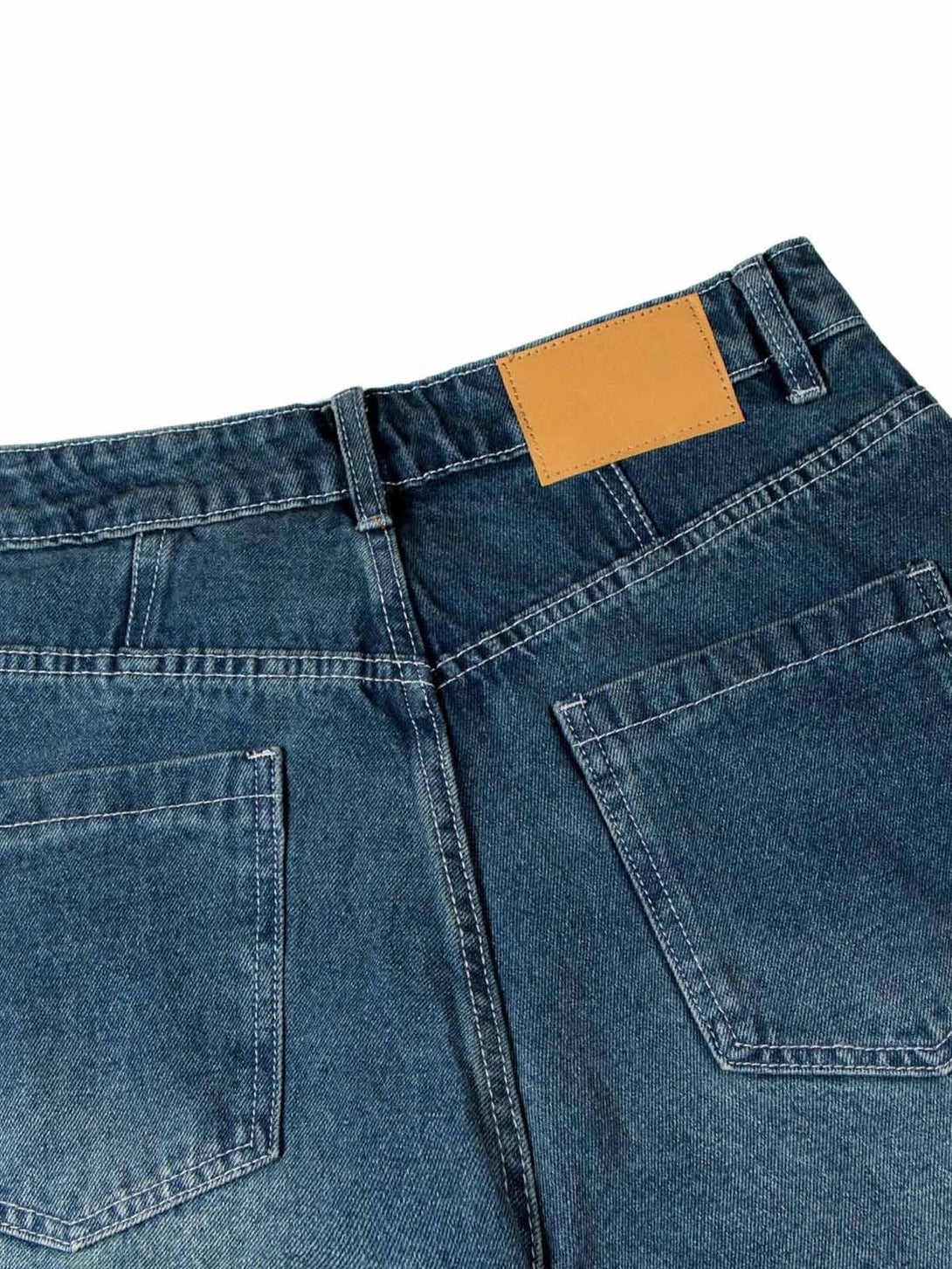 Back view of TALISHKO washed distressed jeans, showcasing detailed stitching and double pleats.