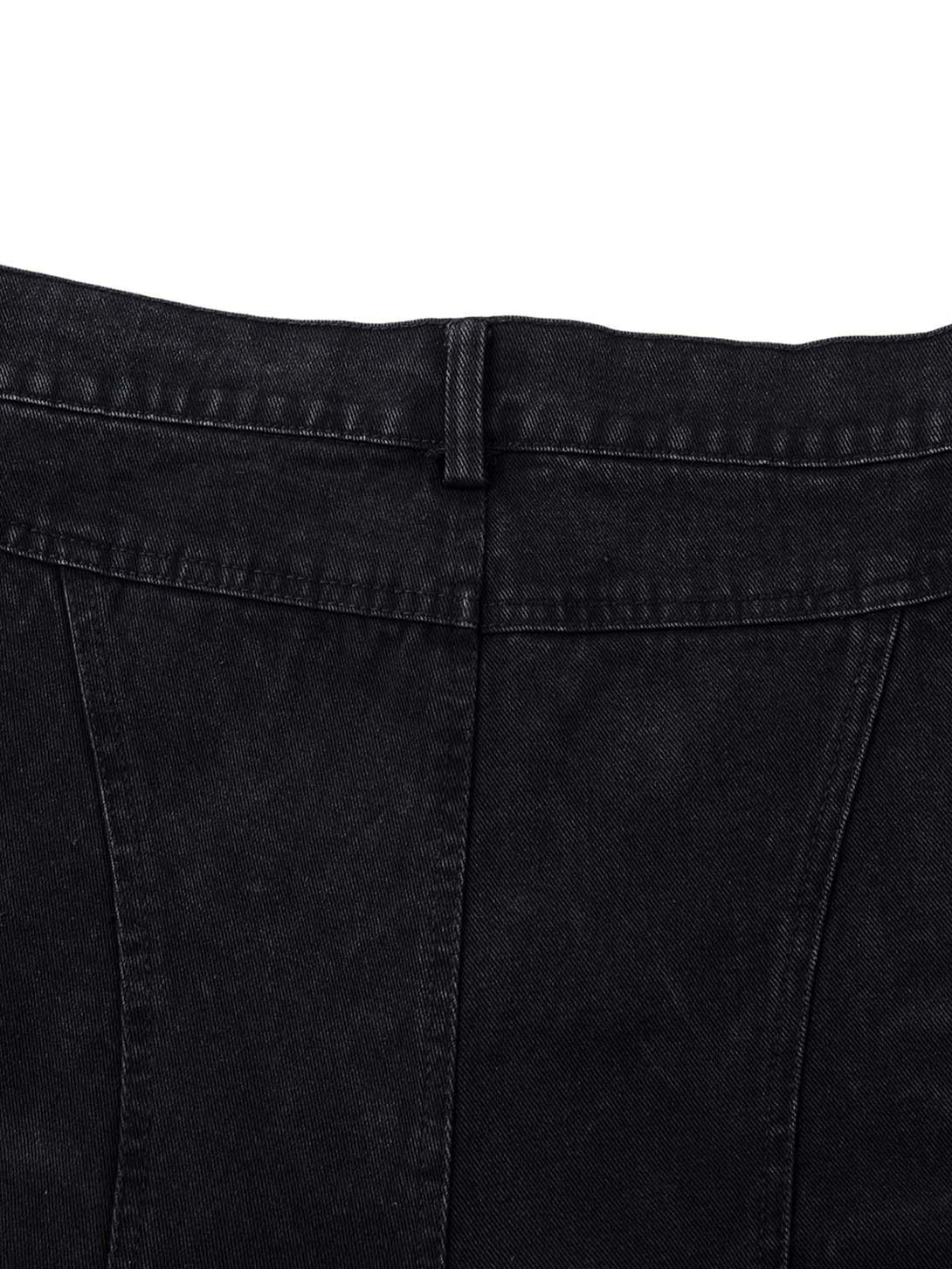 Detailed fabric and stitching on TALISHKO's black washed distressed cargo jeans.