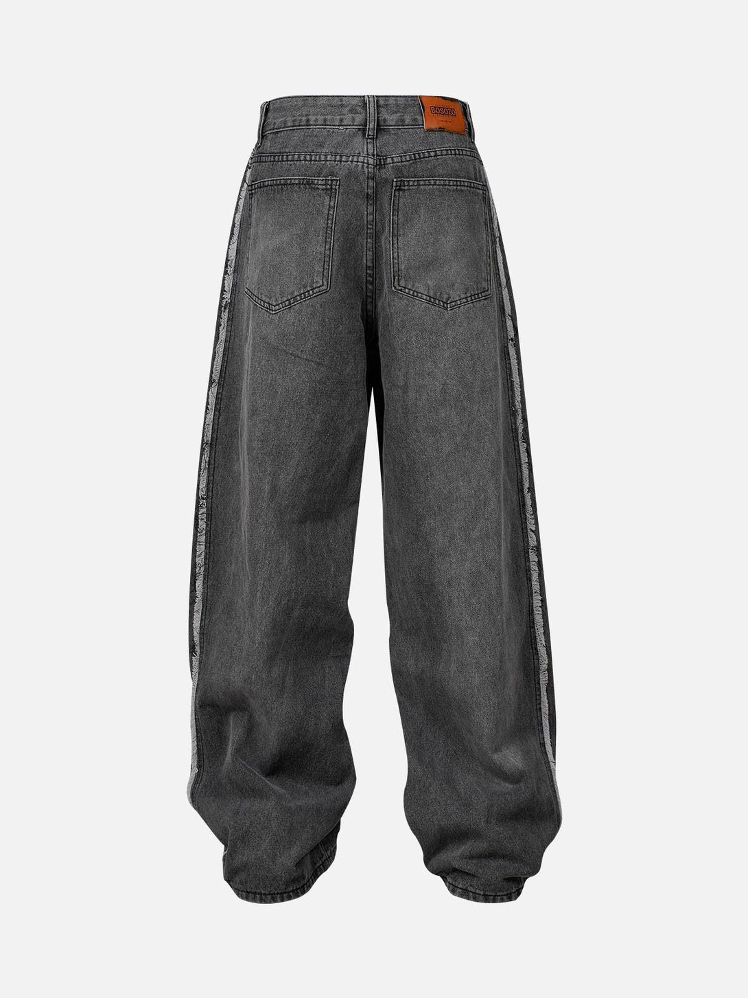 Back view of TALISHKO baggy jeans featuring washed, distressed raw edges and relaxed fit.