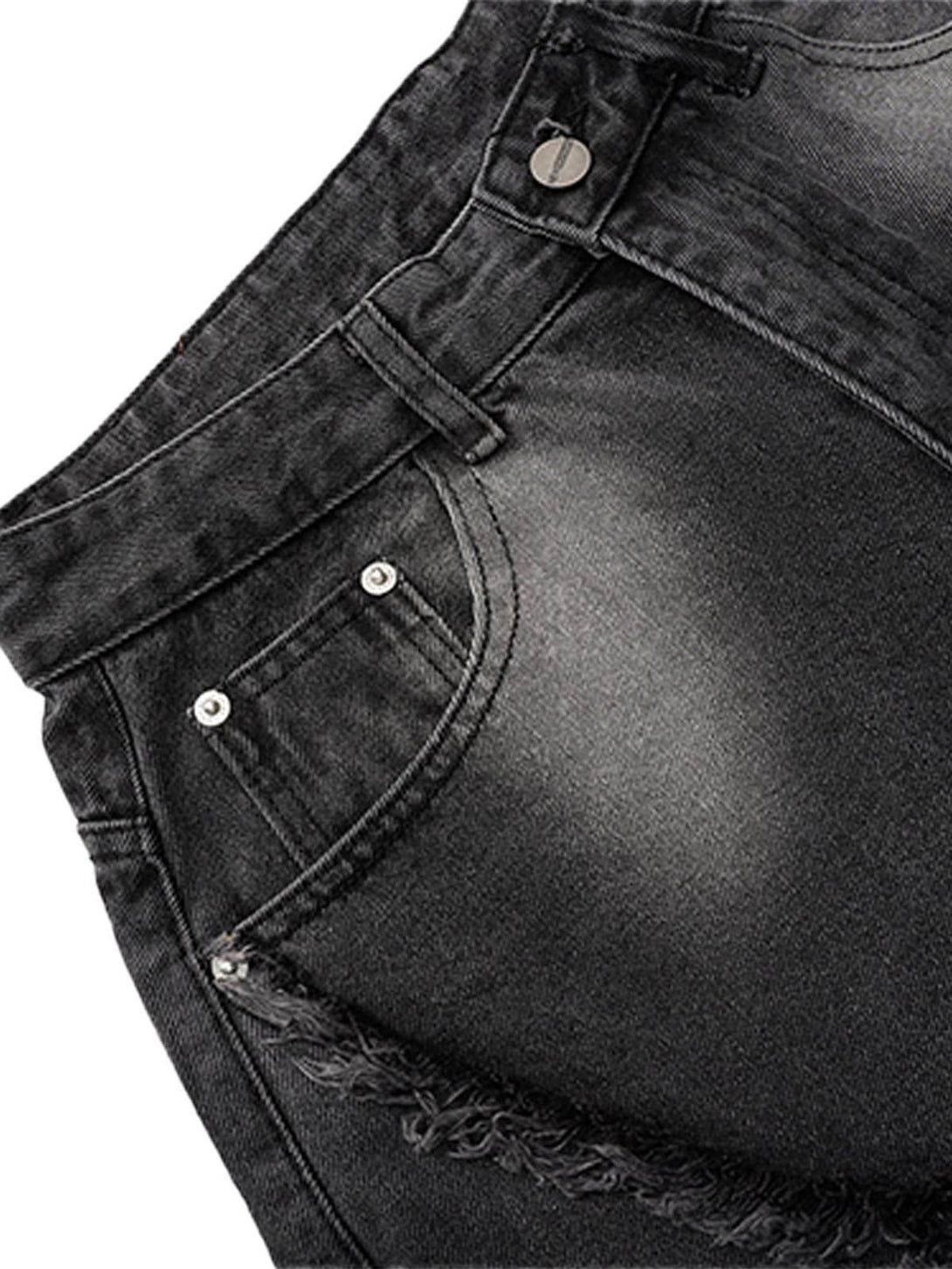 Detailed fabric and stitching of TALISHKO barrel jeans, highlighting raw edge and distressed style.