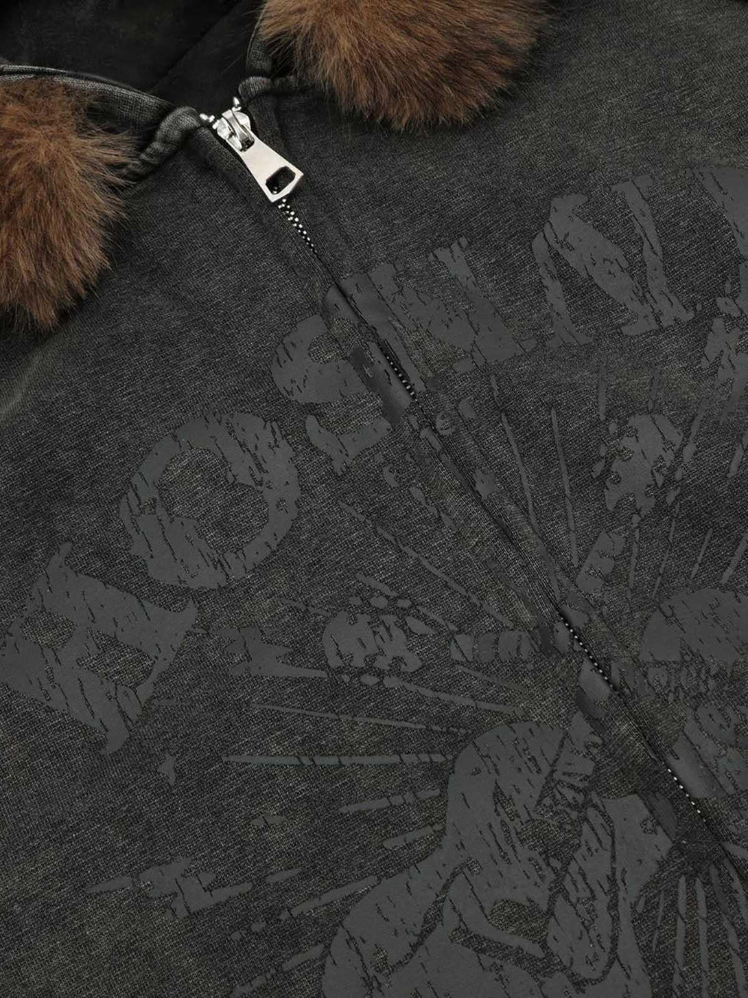Intricate look at the washed texture and fur collar detail on a TALISHKO zip-up hoodie.
