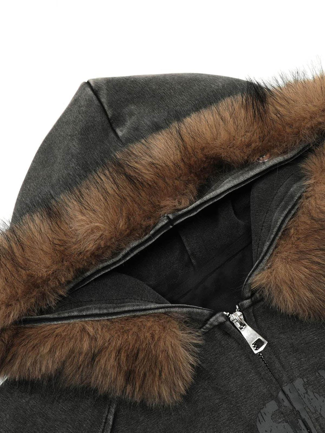 Intricate look at the fur collar and zip detail on a washed hoodie by TALISHKO.