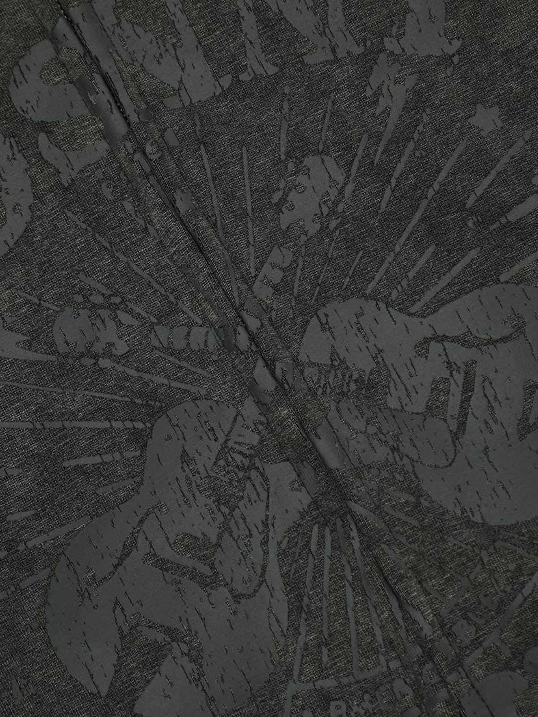 Texture and pattern showcased on the TALISHKO washed hoodie, highlighting unique design elements.