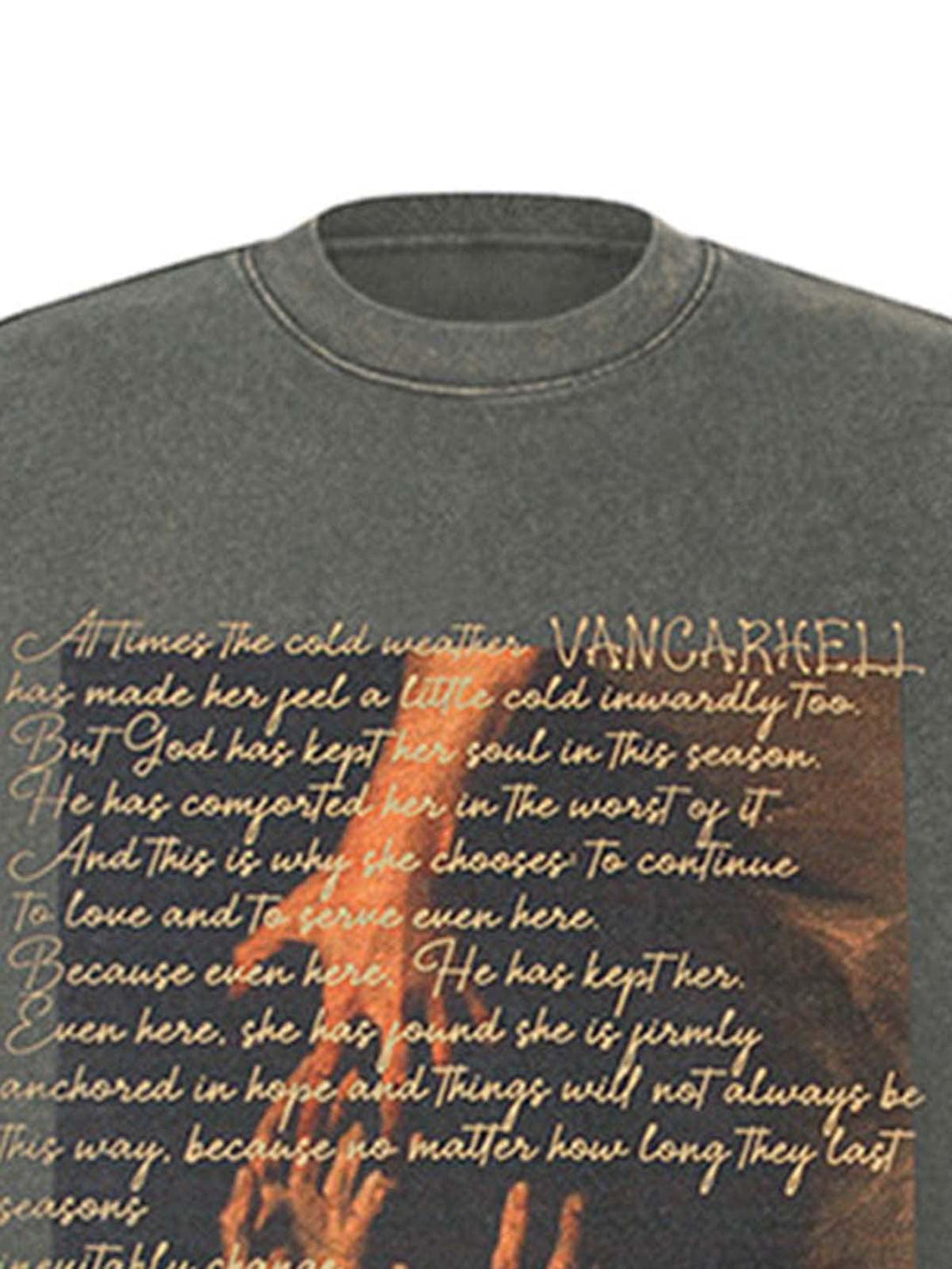 Detailed look at the TALISHKO washed graphic T-shirt, highlighting the unique text and design.