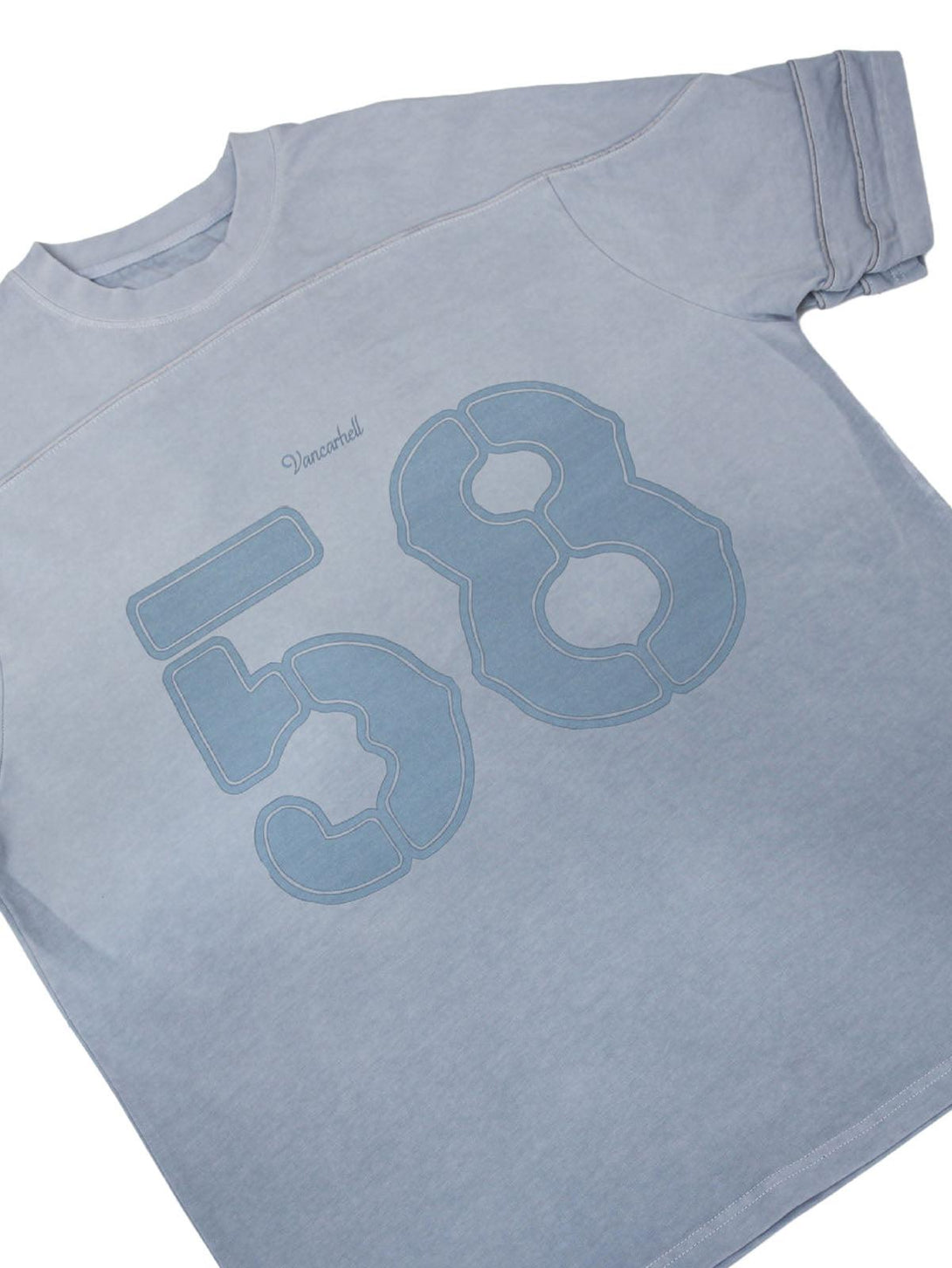 Washed jersey T-shirt by TALISHKO displaying number 58 and welt stitching in a light blue shade.
