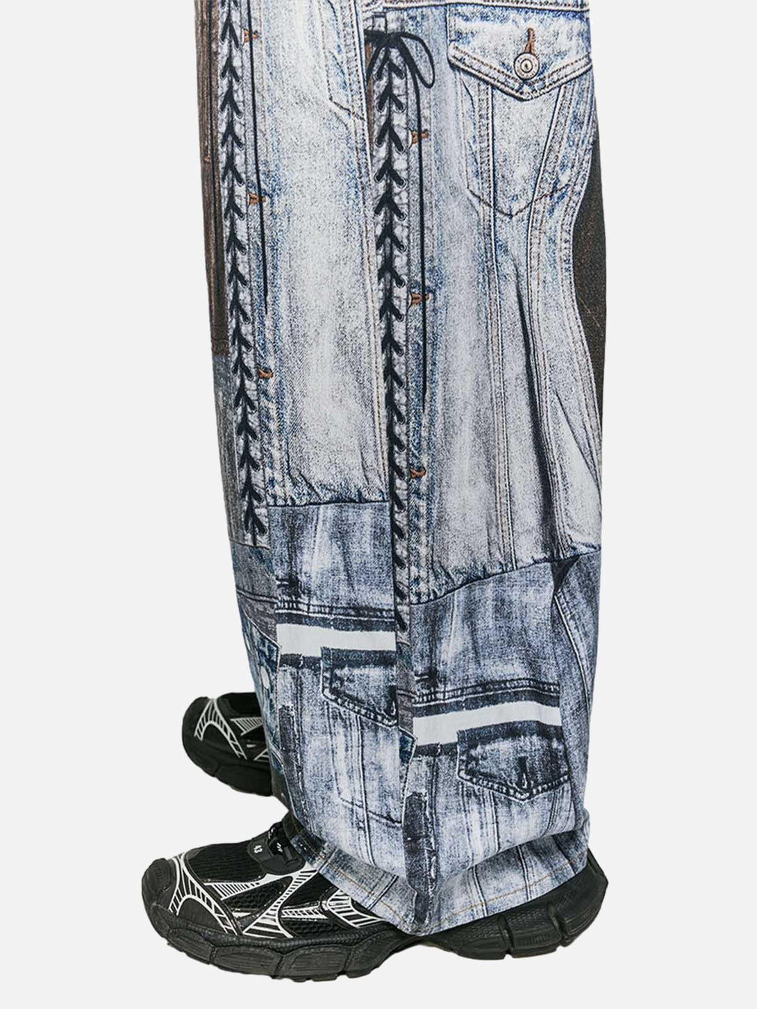 Side view of TALISHKO washed patchwork baggy jeans, emphasizing their denim pattern detail.