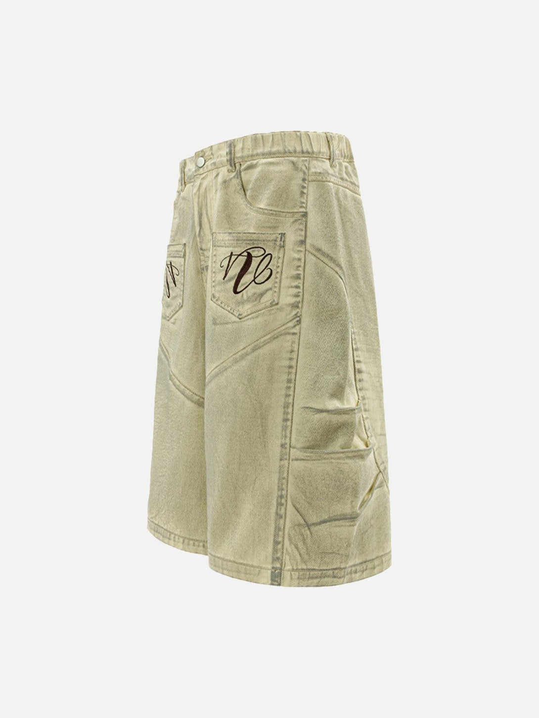 Side view of washed print baggy denim shorts by TALISHKO with embroidered pockets.