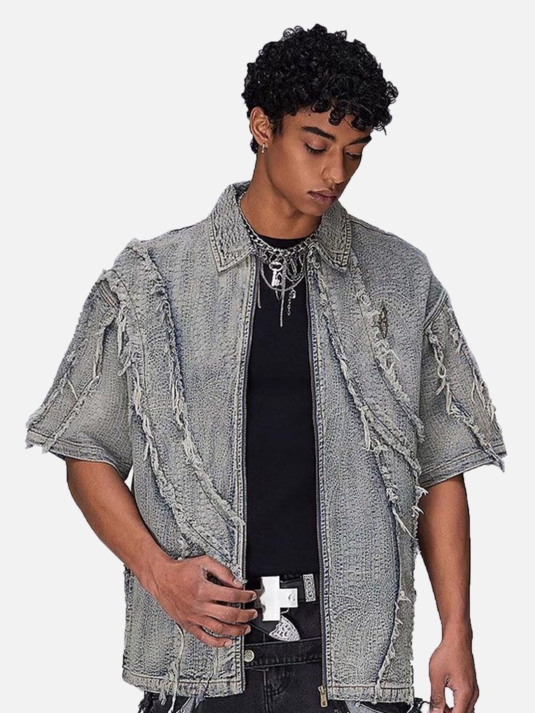 Model wearing TALISHKO washed raw edge denim shirt, highlighting its textured, rugged design.