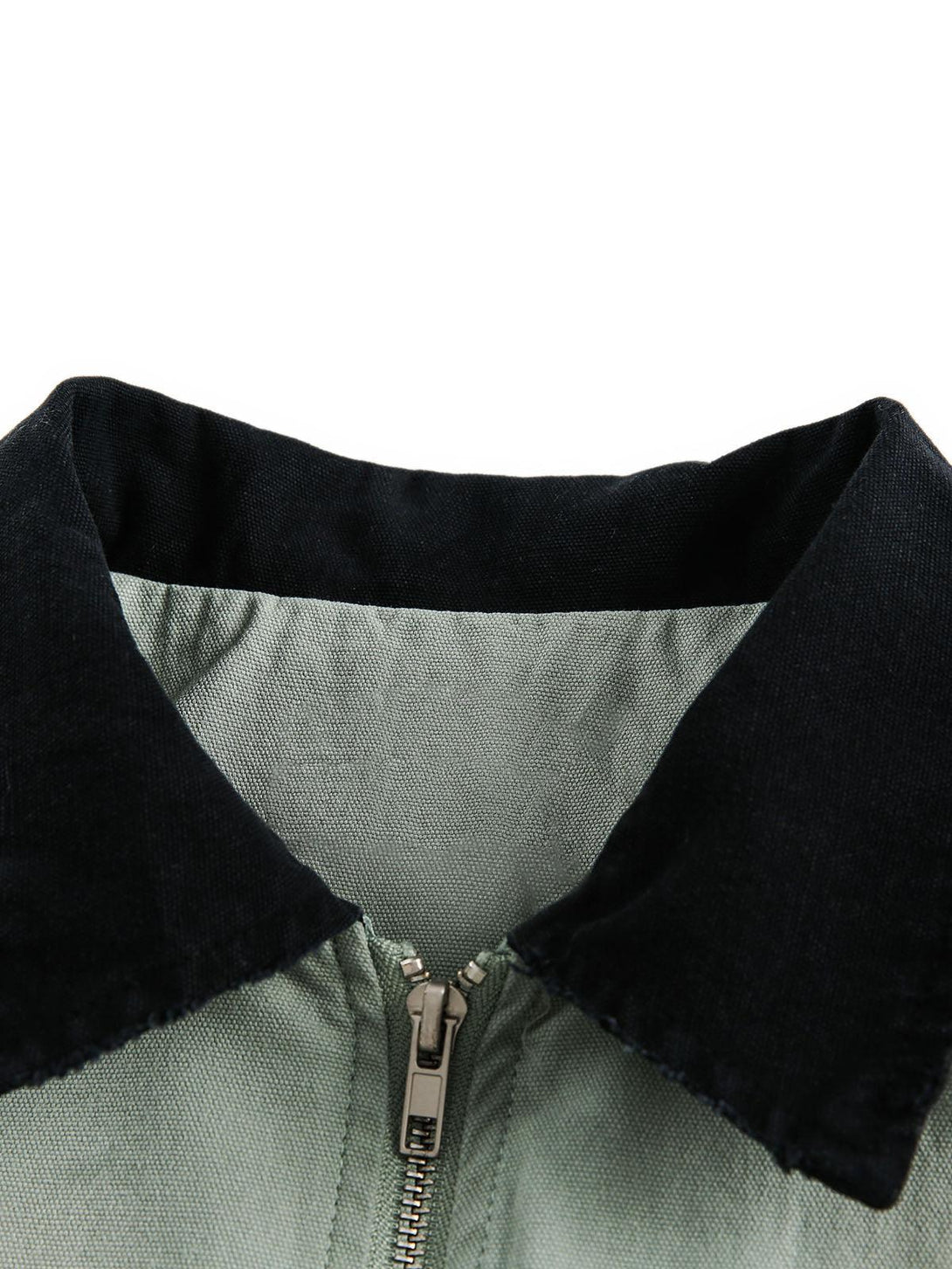 Detailed view of TALISHKO's washed gradient zip-up jacket with contrasting black collar.