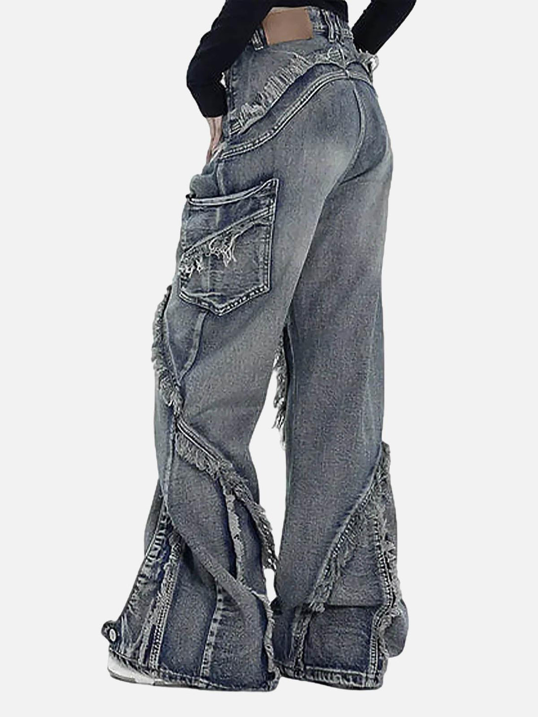 Back view of TALISHKO's washed baggy jeans features raw edges and distinctive side pockets.