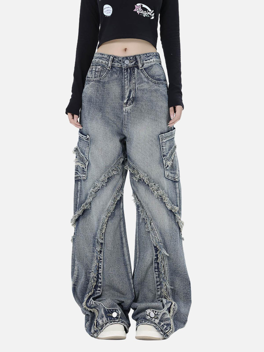 TALISHKO's washed baggy jeans with raw edges and side pockets, styled on a model.