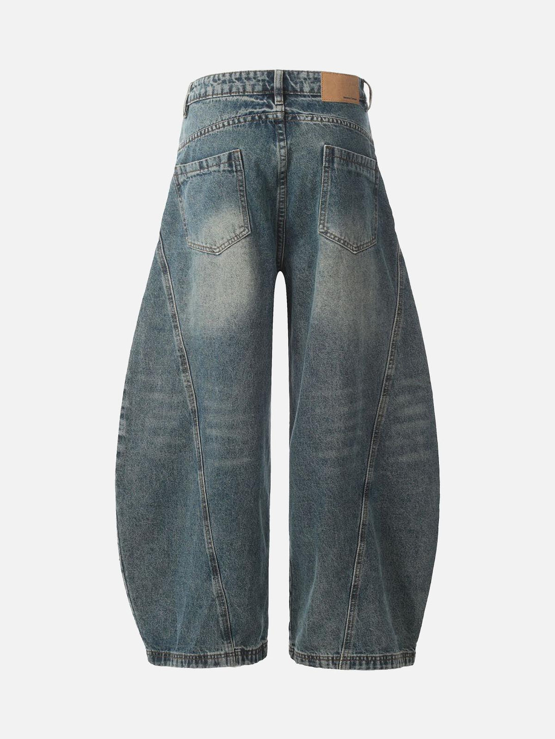 Back view of TALISHKO washed wide-leg balloon jeans showcasing unique denim style.