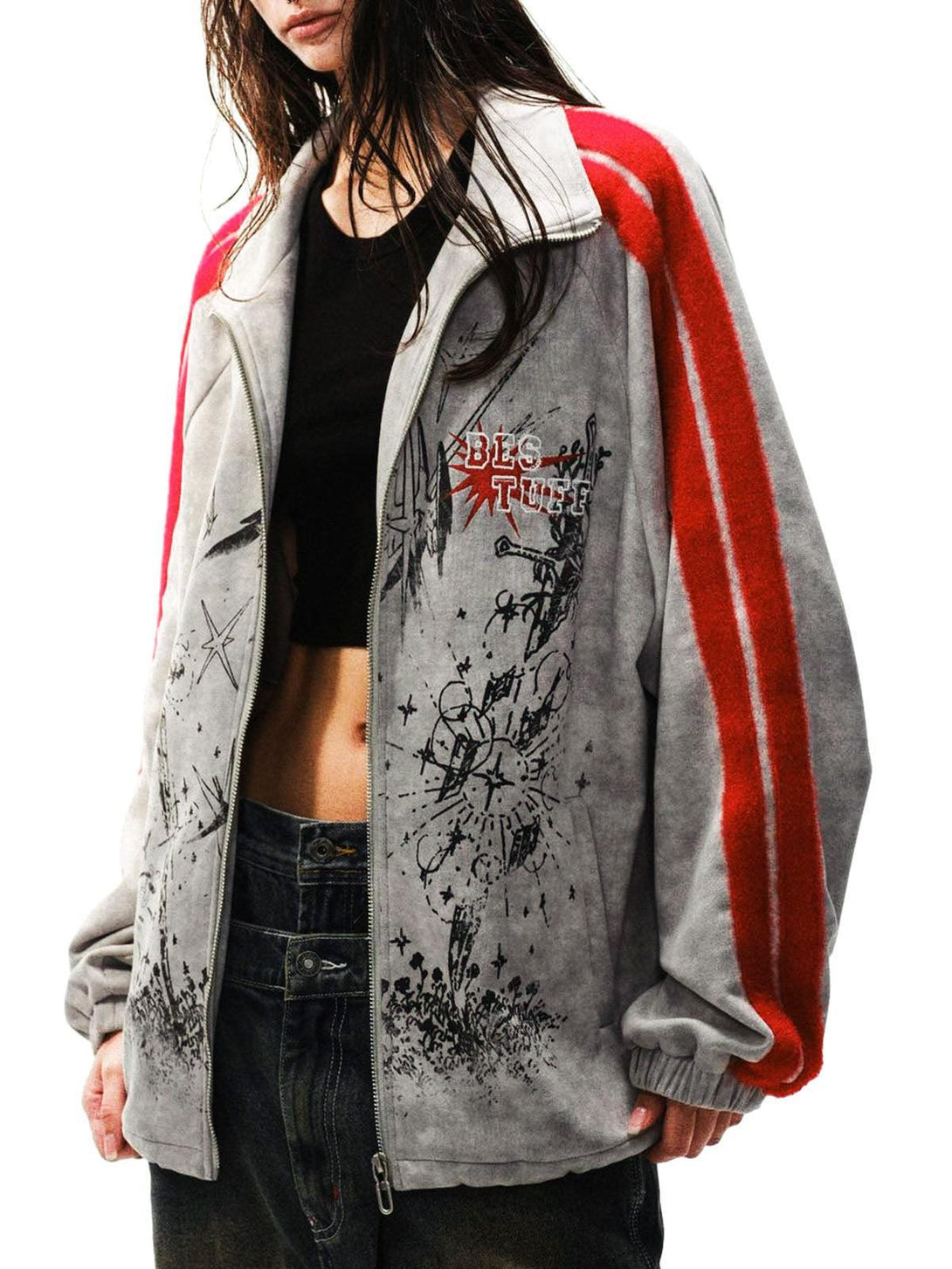 Model wearing TALISHKO's gray zip-up jacket with red stripes and graffiti details.