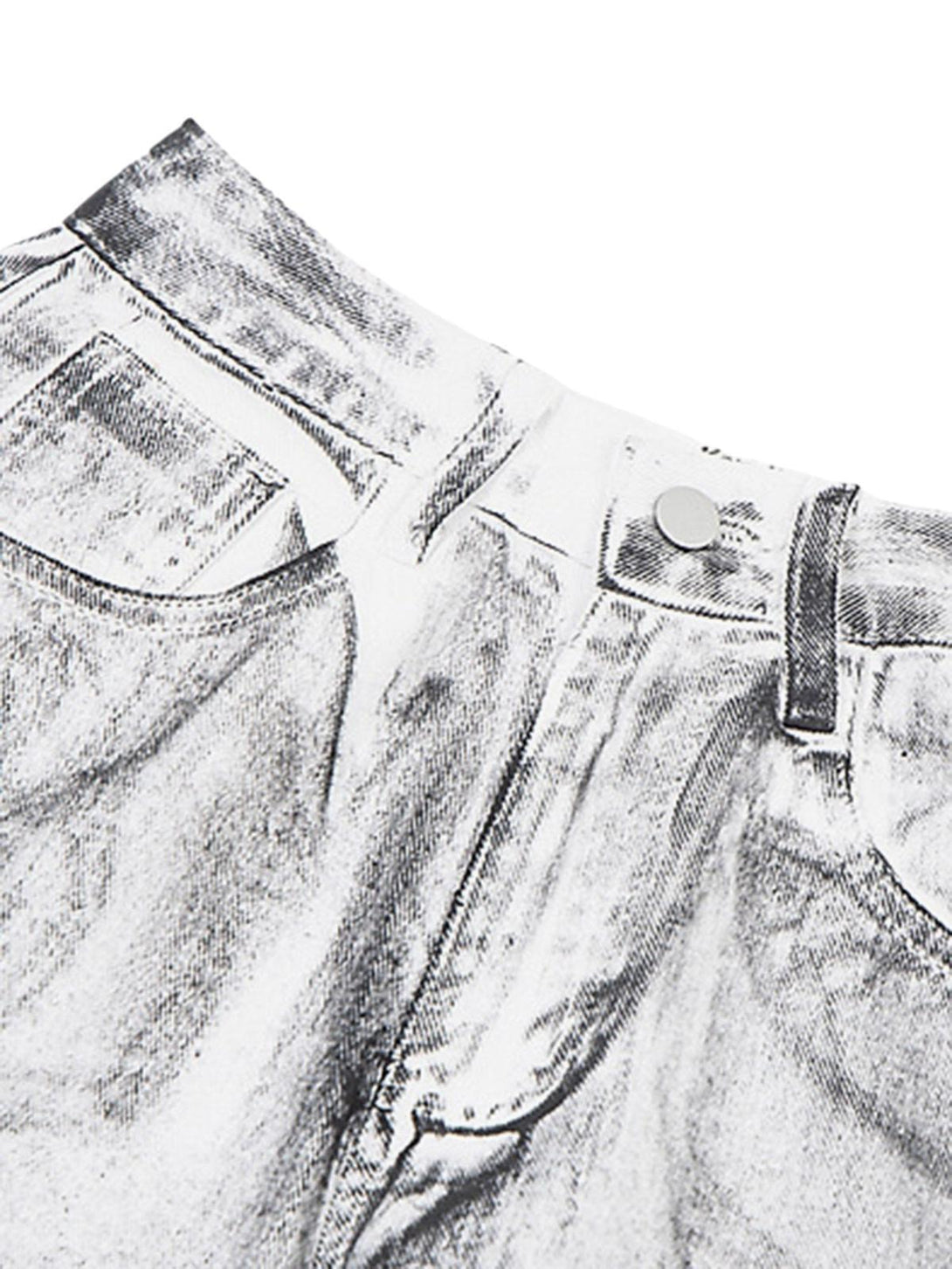 Intricate look at TALISHKO's distressed white jeans, highlighting unique texture and design detail.