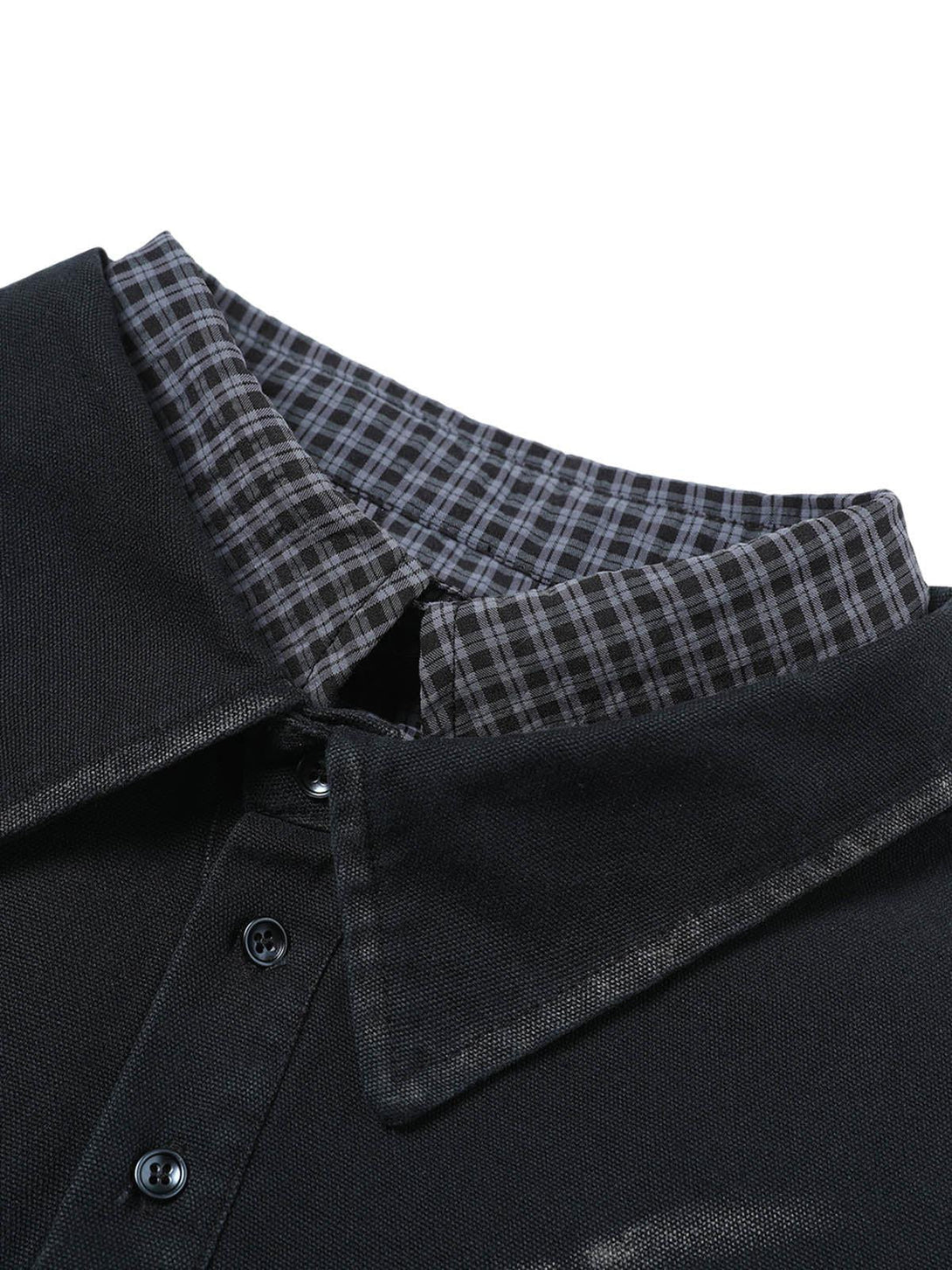 Detailed view of TALISHKO's retro washed shirt collar with plaid pattern, highlighting texture.