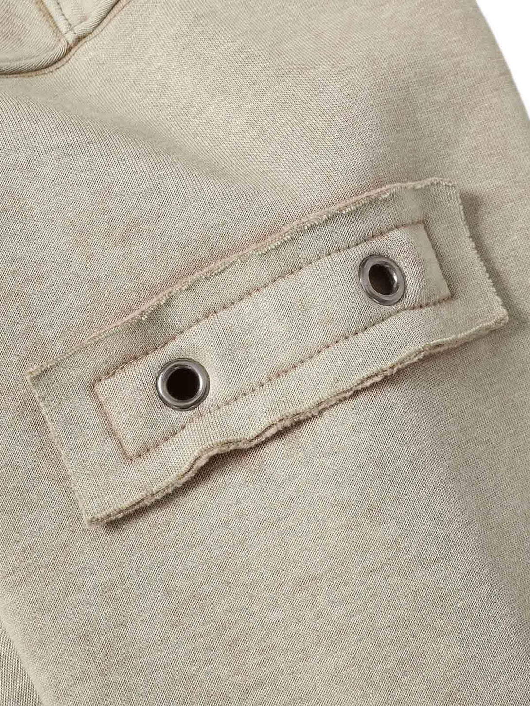 "TALISHKO's washed zipper-up sweatshirt features rugged grommet details and unique stitching."
