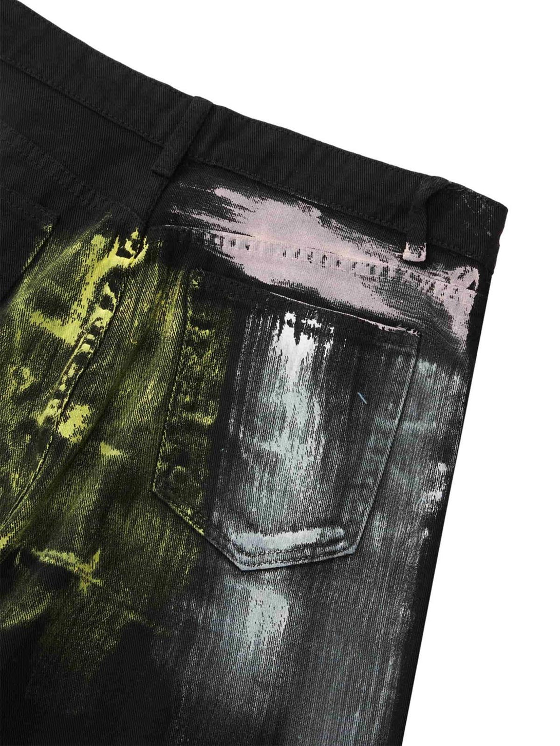 Artistic details of TALISHKO watercolor print jeans, highlighting vibrant pocket design.