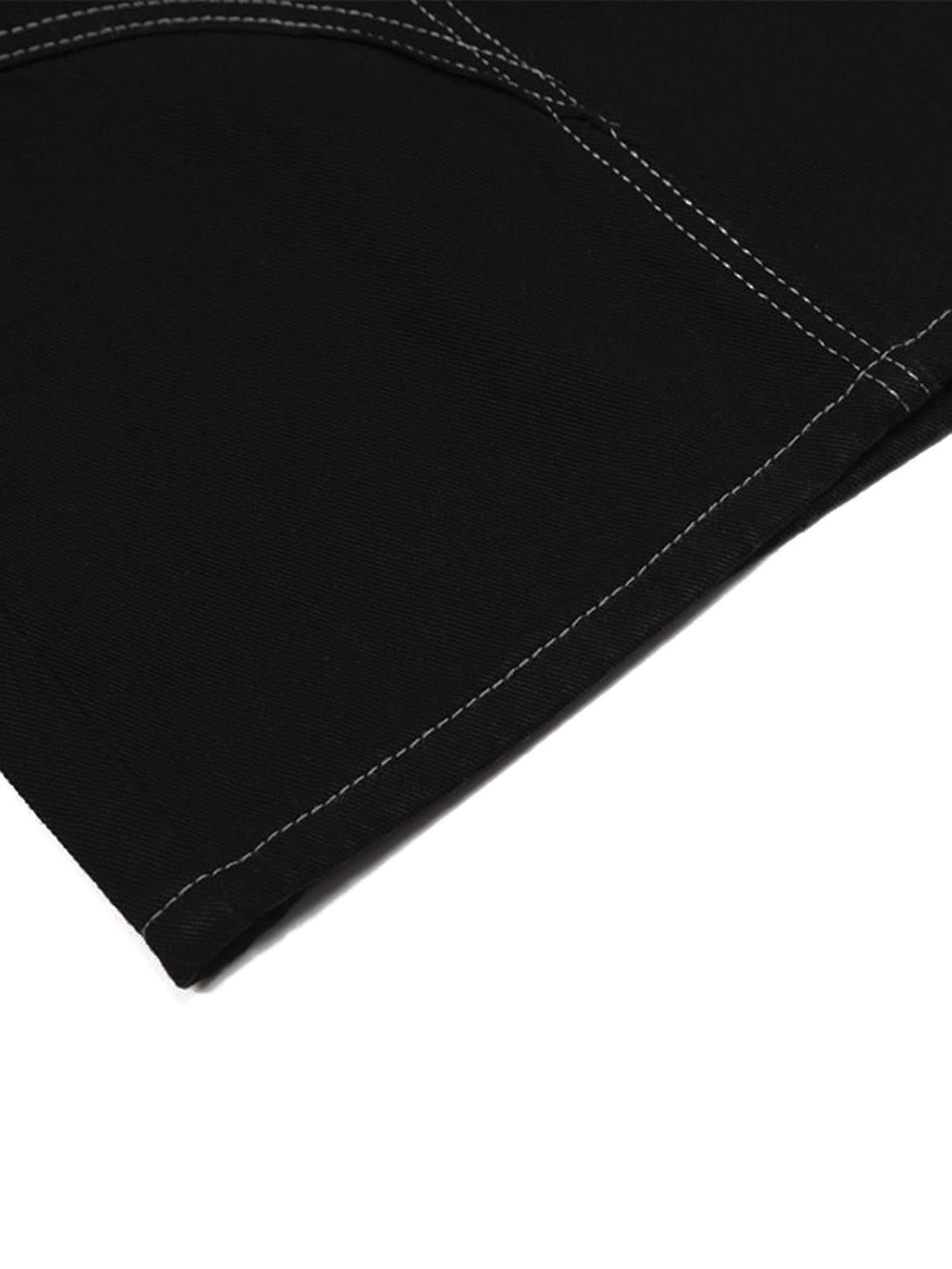 Detailed fabric and stitching view of black cargo jorts by TALISHKO, showcasing craftsmanship.