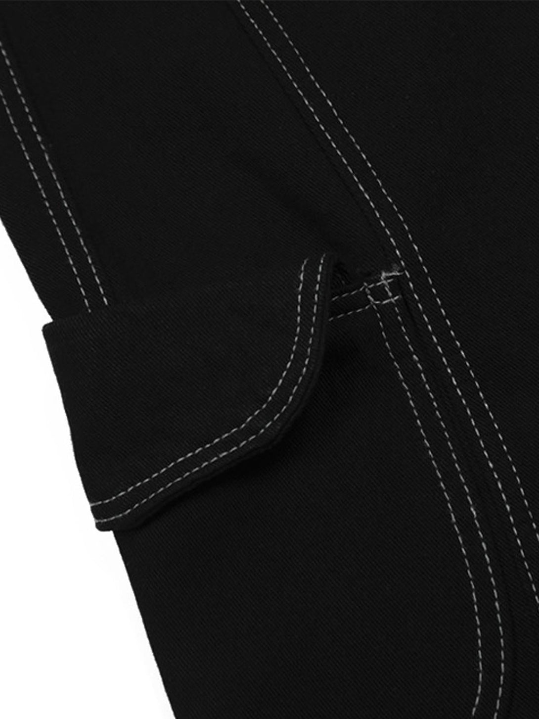 Intricate look at TALISHKO cargo jorts, highlighting welt embellishment and stitching detail.
