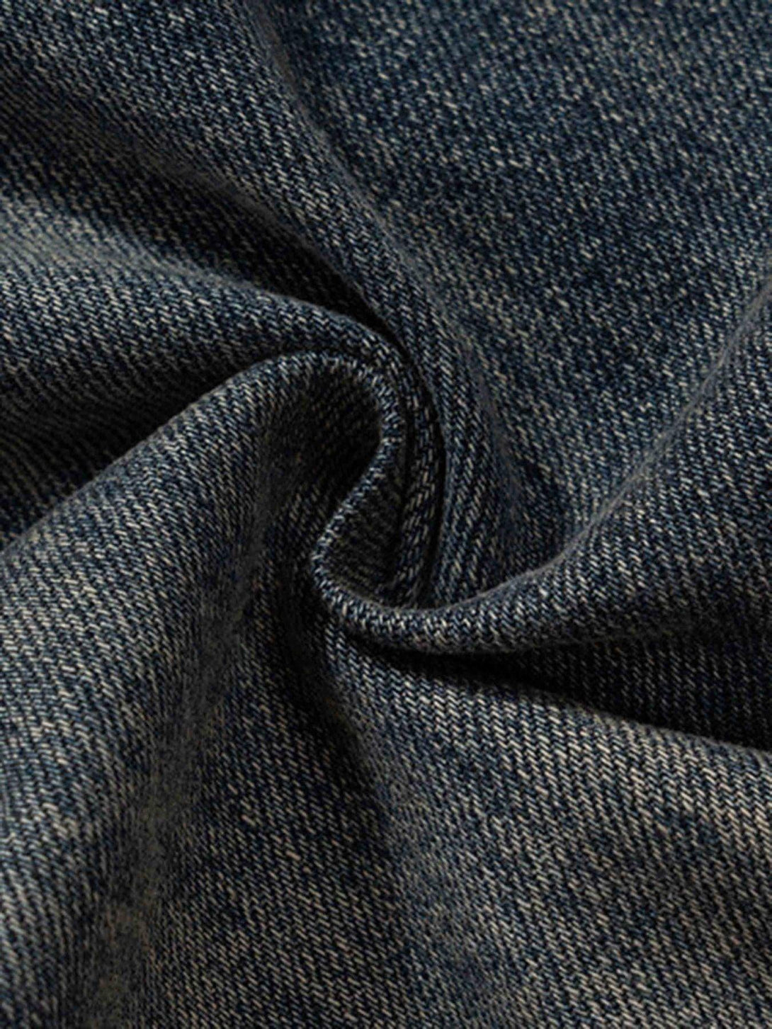 "Texture and weave detail of TALISHKO wide-leg jeans, highlighting durable denim quality."